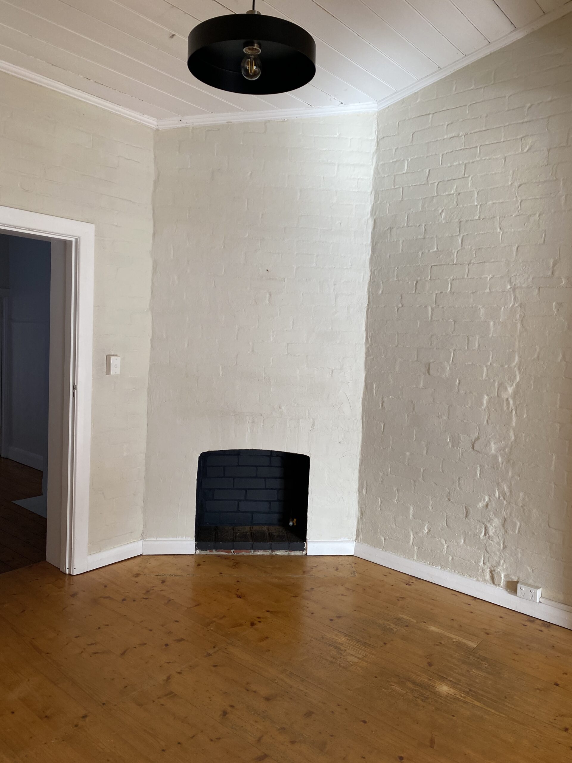 Before the fireplace makeover in my new showroom