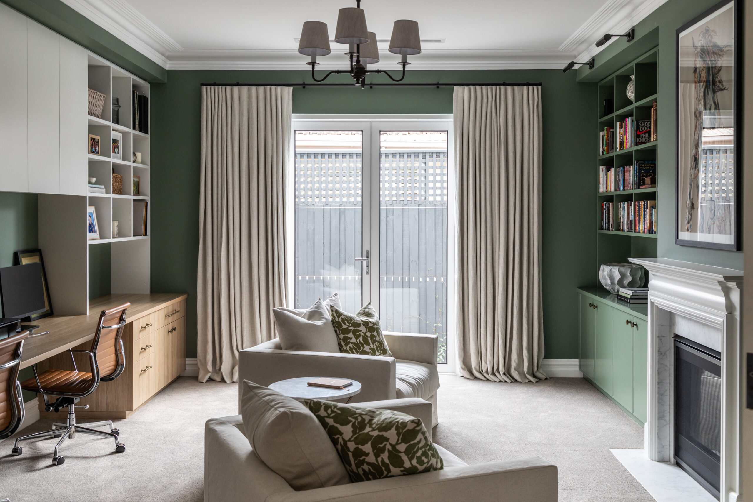 green home office and library room